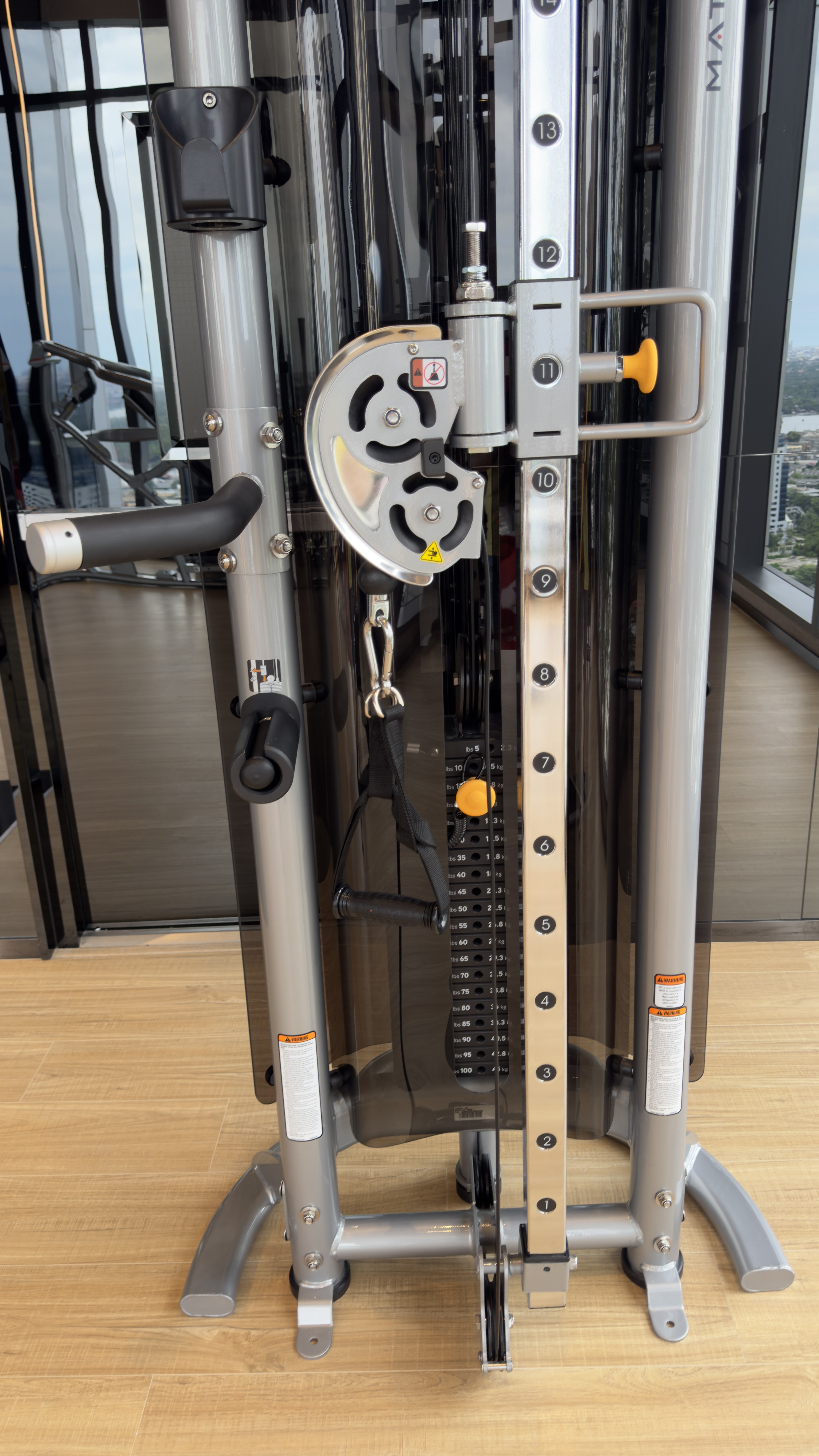 Adjustable cable weight machine