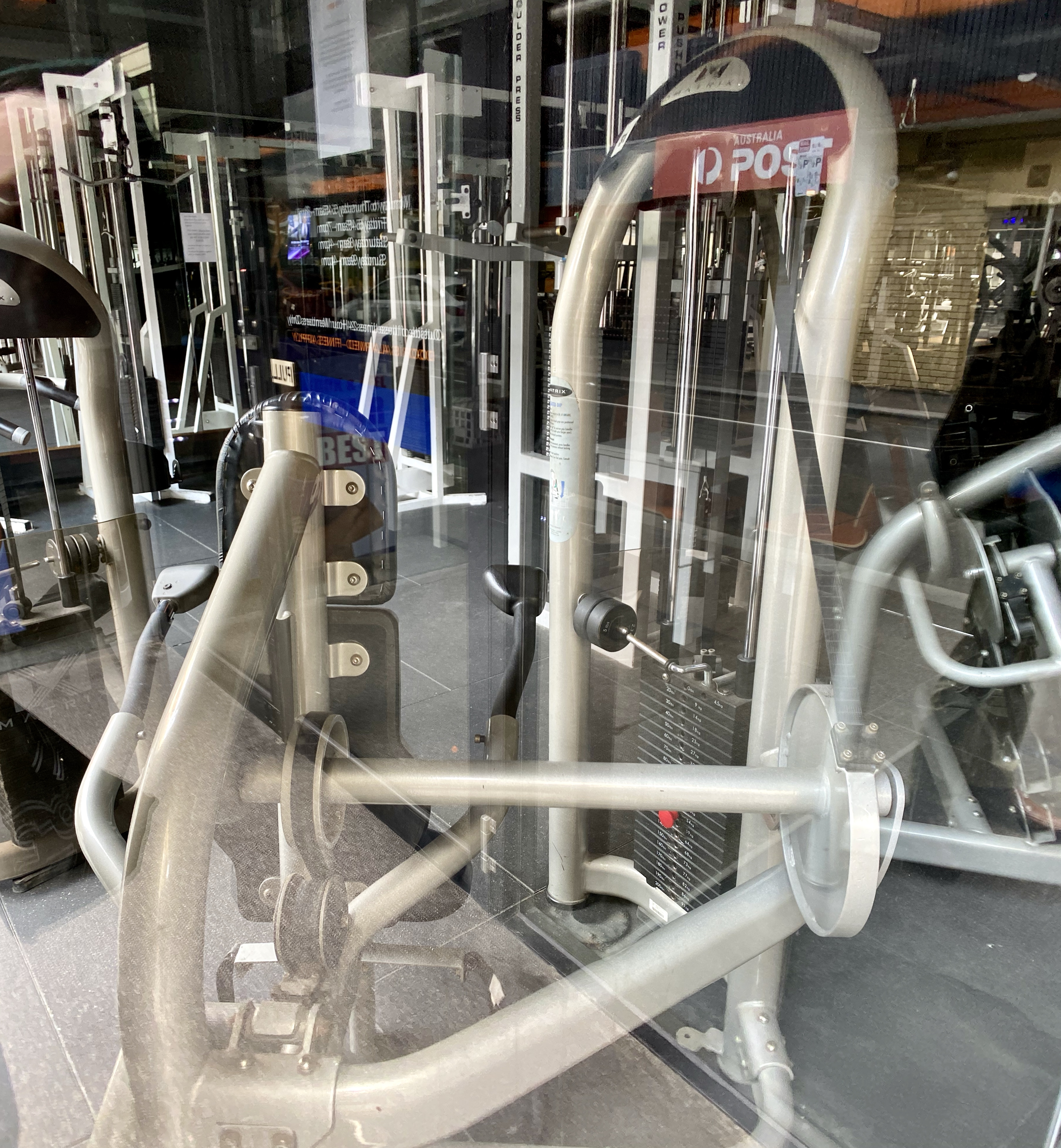 Strength-training machines on a gym floor